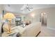Inviting living room with hardwood floors, vaulted ceilings, ceiling fan, and comfortable seating for relaxing at 891 Bayard St, Port Charlotte, FL 33948