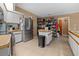 Spacious kitchen with stainless steel appliances and plenty of cabinet space at 10229 Gulfstream Blvd, Englewood, FL 34224