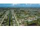 Aerial view showcasing a well-planned community with canals, lakes and nearby ocean access at 1 Sportsman Cir, Rotonda West, FL 33947