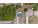 Birds eye view of the property layout and location among other properties and foliage at 10133 Gulfstream Blvd, Englewood, FL 34224