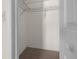 Walk-in closet includes adjustable wire shelving and carpet at 10133 Gulfstream Blvd, Englewood, FL 34224