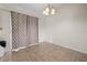 Cozy dining room with tile floors featuring neutral curtains and a chandelier, with bright natural lighting at 10133 Gulfstream Blvd, Englewood, FL 34224