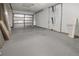 Spacious garage with unfinished drywall and ample storage space at 10133 Gulfstream Blvd, Englewood, FL 34224