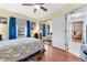 This bedroom offers a spacious closet with mirrored doors and a neutral color scheme at 1041 S Salford Blvd, North Port, FL 34287