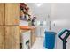 Functional laundry room with ample storage space and modern appliances for convenience at 1041 S Salford Blvd, North Port, FL 34287