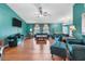 Bright living room offering hardwood floors and ample seating at 1041 S Salford Blvd, North Port, FL 34287