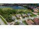 Scenic aerial view of property near golf course and lake in a well-maintained community at 1062 Eagles Flight Way, North Port, FL 34287