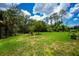 Expansive green backyard perfect for outdoor activities at 1062 Eagles Flight Way, North Port, FL 34287