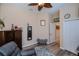 Bedroom featuring a grey recliner and bench at 1062 Eagles Flight Way, North Port, FL 34287
