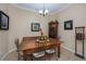 Cozy dining room featuring a rustic table, unique lighting, and charming decor at 1062 Eagles Flight Way, North Port, FL 34287