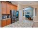 Well-designed kitchen featuring stainless steel appliances, granite countertops, and ample cabinetry at 1062 Eagles Flight Way, North Port, FL 34287