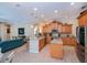 Well-lit kitchen with granite countertops, stainless steel appliances, and ample cabinet space at 1062 Eagles Flight Way, North Port, FL 34287