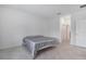 Another bedroom view showcasing tile flooring, two doors, and basic furnishings at 11088 Pinot Dr, Venice, FL 34293