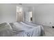 Spacious bedroom showcasing tile floors and views into the hallway and other rooms at 11088 Pinot Dr, Venice, FL 34293