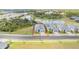 Well-maintained single-Gathering home with two-car garage on a waterfront lot with pristine landscaping at 11088 Pinot Dr, Venice, FL 34293