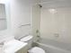 Bathroom with a vanity, toilet and a tiled tub at 13100 S Mccall Rd # 125, Port Charlotte, FL 33981