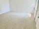 Bright bedroom featuring neutral walls and tile floor at 13100 S Mccall Rd # 125, Port Charlotte, FL 33981