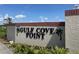 Elegant community sign for Gulf Cove Point, surrounded by manicured greenery at 13100 S Mccall Rd # 125, Port Charlotte, FL 33981