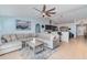 Open-concept living space seamlessly blends the living room and kitchen, perfect for modern living at 1444 Frisco Ter, Port Charlotte, FL 33953