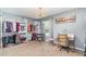 Spacious walk-in closet, organized with open shelving and ample storage space at 1444 Frisco Ter, Port Charlotte, FL 33953