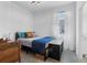 Bright bedroom with natural light, a full size bed, and stylish décor at 15069 Anchorage Rd, Punta Gorda, FL 33982