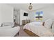 Serene bedroom with natural light, a cozy bed, and stylish decor at 16176 Lotus Way, Punta Gorda, FL 33982