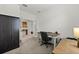 Office featuring desk, chair, cabinet, and neutral decor at 16176 Lotus Way, Punta Gorda, FL 33982