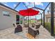 Enjoy the fresh air with comfortable patio furniture and shade from the Florida sun at 1721 Walden Ct, Englewood, FL 34224