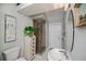 Modern bathroom with glass shower, vanity, and updated fixtures at 17400 White Water Ct, Punta Gorda, FL 33982