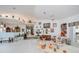 Expansive living room featuring tile floors, high ceilings, and eclectic decorations at 17400 White Water Ct, Punta Gorda, FL 33982