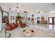 Open living area with tile floors, high ceilings, eclectic decor, and tiered levels at 17400 White Water Ct, Punta Gorda, FL 33982