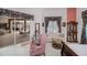Main bedroom offers comfortable seating and an inviting backyard view at 17400 White Water Ct, Punta Gorda, FL 33982