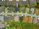 Aerial view of a single-Gathering home in a well-maintained neighborhood with mature trees at 1812 Birmingham Blvd, Punta Gorda, FL 33980