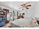Bedroom featuring french doors to the pool, a ceiling fan, and light walls at 18585 Klingler Cir, Port Charlotte, FL 33948