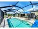 Gorgeous private pool with screened enclosure and ample patio space for outdoor enjoyment at 18585 Klingler Cir, Port Charlotte, FL 33948