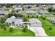 Inviting single-Gathering home with attached two-car garage, luscious lawn and tropical landscaping at 23493 Taber Ave, Port Charlotte, FL 33954