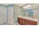 Bathroom with double vanity, granite countertop, and tile flooring at 237 Strasburg Dr, Port Charlotte, FL 33954