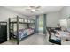 Bedroom featuring a bunk bed, and plenty of natural light creating a functional and inviting atmosphere at 237 Strasburg Dr, Port Charlotte, FL 33954