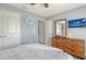 Bedroom featuring a ceiling fan, lots of closet space, and ample natural light for a cozy ambiance at 237 Strasburg Dr, Port Charlotte, FL 33954