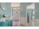 Bright foyer featuring tile floors and decorative elements, leading into the home's interior at 237 Strasburg Dr, Port Charlotte, FL 33954