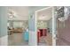 Inviting foyer with views of the living room and kitchen, showcasing the home's open layout at 237 Strasburg Dr, Port Charlotte, FL 33954