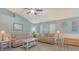 Cozy living room with vaulted ceilings, comfortable seating, and stylish décor at 237 Strasburg Dr, Port Charlotte, FL 33954