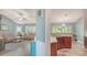 Inviting living room features modern flooring that seamlessly connects to the adjacent kitchen area at 237 Strasburg Dr, Port Charlotte, FL 33954