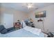 Bedroom featuring a TV, large desk area and comfortable seating space at 2387 Nuremberg Blvd, Punta Gorda, FL 33983