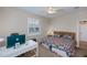 Bedroom with a comfortable bed and a dedicated workspace with a computer and desk at 2387 Nuremberg Blvd, Punta Gorda, FL 33983