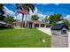 Charming home with a well-kept lawn, tile roof, double garage, and picturesque landscaping at 2387 Nuremberg Blvd, Punta Gorda, FL 33983