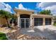 Welcoming home facade featuring stylish accents, neutral tones, and well-maintained landscaping at 2387 Nuremberg Blvd, Punta Gorda, FL 33983