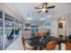 Cozy living room with modern furnishings, including a comfortable seating arrangement and ceiling fan at 2387 Nuremberg Blvd, Punta Gorda, FL 33983