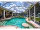 Enjoy the outdoors in this beautiful enclosed pool with a fun design and relaxing atmosphere at 2387 Nuremberg Blvd, Punta Gorda, FL 33983