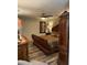Luxurious bedroom featuring elegant furniture, a ceiling fan, and soft lighting for a comfortable ambiance at 26129 Madras Ct, Punta Gorda, FL 33983